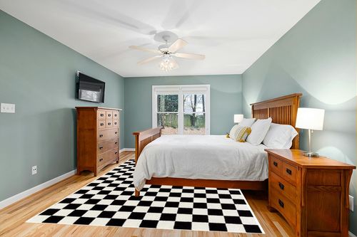 Luxe Weavers Modern Checkered Area Rug Black 8x10 Stain Resistant Carpet for Living Room in Teal and Orange Wood Bedroom