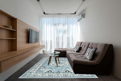 SAFAVIEH Isabella Collection Area Rug - 8' x 10', Light Blue & Cream, Oriental Design, Non-Shedding & Easy Care, Ideal for High Traffic Areas in Living Room, Bedroom (ISA921M) in Grey Living Room with Brown Couch