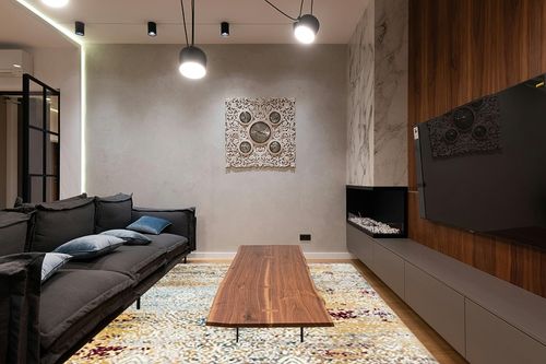 SAFAVIEH Aria Collection Area Rug - 9' x 12', Yellow & Cream, Boho Chic Distressed Design, Non-Shedding & Easy Care, Ideal for High Traffic Areas in Living Room, Bedroom (ARA183Y) in Dark Wood Living Room with Black Couch