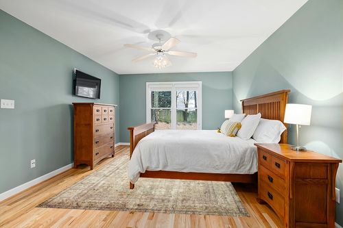 Loloi II Margot Collection MAT-01 Antique/Sage 7'-6" x 9'-6" Area Rug feat. CloudPile in Teal and Orange Wood Bedroom