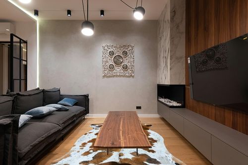 bonanza leathers Genuine Cowhide Rug Tricolor Size S/L/XL 5X6/6X7/7X8 FT (XL) in Dark Wood Living Room with Black Couch