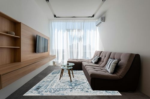 Artistic Weavers Desta Vintage Oriental Area Rug, 7'10" x 10'2", Blue/White in Grey Living Room with Brown Couch