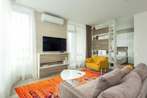 SAFAVIEH Monaco Collection Area Rug - 8' x 10', Orange & Multi, Modern Boho Abstract Distressed Design, Non-Shedding & Easy Care, Ideal for High Traffic Areas in Living Room, Bedroom (MNC209H) in Light Modern Living Room with TV