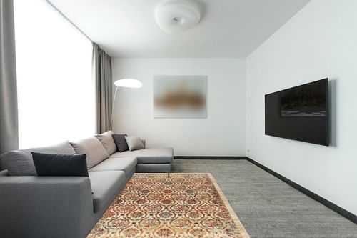 Antep Rugs Alfombras Non-Skid (Non-Slip) 5x7 Rubber Backing Floral Geometric Low Profile Pile Indoor Area Rugs (Beige Multi, 5' x 7') in Modern Living Room with Grey Couch