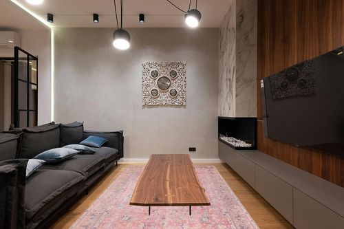 GLN Rugs Stain Resistant Machine Washable Area Rug - Vintage Boho Distressed Aesthetic - Non-Slip Backing - Indoor Floor Home Decor for Bedroom Kitchen Living & Dining Room (6' x 9') in Dark Wood Living Room with Black Couch