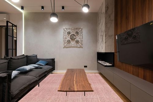 nuLOOM Daniela Farmhouse Chunky Jute Area Rug, 8x10, Baby Pink in Dark Wood Living Room with Black Couch