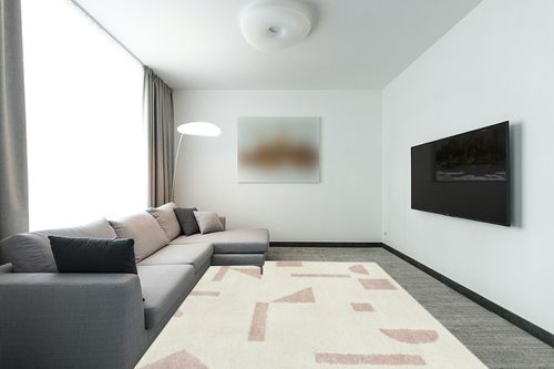 BALTA Gibson Navy 7 ft. 10 in. x 10 ft. Geometric Area Rug, Blue in Modern Living Room with Grey Couch