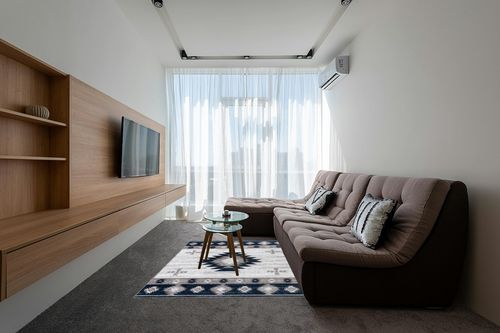 Well Woven Southwestern Rodrigo 5'3" x 7'3" Blue Area Rug in Grey Living Room with Brown Couch