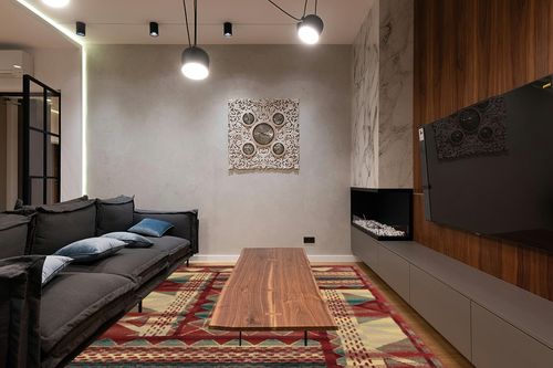 GlowSol Area Rug 8x10 Bohemian Area Rug for Living Room Bedroom Thick Durable Stain-Resistant Rug Low Pile Dining Office Mat Non-Shedding Carpet for Bedroom Nursery Basement Decor in Dark Wood Living Room with Black Couch