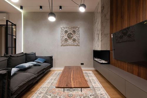Valenrug Washable Area Rug 6x9 - Ultra-Thin Antique Collection, Stain Resistant Rugs for Living Room Bedroom, Distressed Vintage Rug(Peach/Yellowish, 6'x9') in Dark Wood Living Room with Black Couch