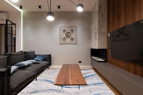 Safavieh Palma Collection Area Rug - 9' x 12', Beige & Light Blue, Modern Abstract Design, Non-Shedding & Easy Care, Ideal for High Traffic Areas in Living Room, Bedroom (PAM334A) in Dark Wood Living Room with Black Couch