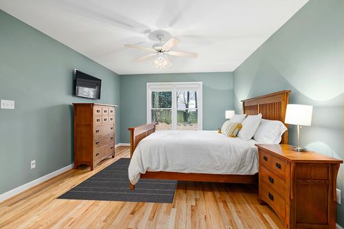 nuLOOM Alaina Indoor/Outdoor Striped Area Rug, 5x8, Black in Teal and Orange Wood Bedroom
