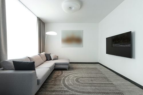 Safavieh Urban Collection Area Rug - 8' x 10', Beige & Ivory, Mid-Century Modern Tassel Fringe Design, Non-Shedding & Easy Care, Ideal for High Traffic Areas in Living Room, Bedroom (URB210B) in Modern Living Room with Grey Couch