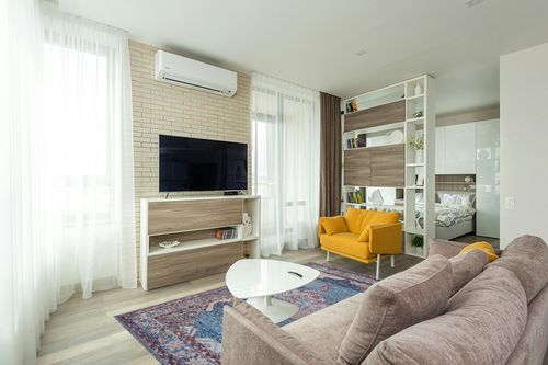 SAFAVIEH Vintage Oushak Collection Area Rug - 5' x 8', Blue, Handmade Boho Oriental Distressed, Ideal for High Traffic Areas in Living Room, Bedroom (VOS740A) in Light Modern Living Room with TV