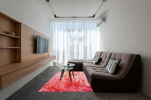 SAFAVIEH Adirondack Collection Area Rug - 5'1" x 7'6", Red & Gold, Modern Abstract Design, Non-Shedding & Easy Care, Ideal for High Traffic Areas in Living Room, Bedroom (ADR207R) in Grey Living Room with Brown Couch