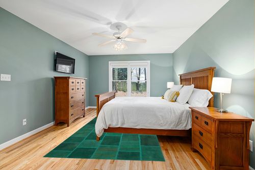 BESPOKY 6'5" x 9'8" (195x295 Cm) Teselya Green Patchwork Wool Handmade Area Rug in Teal and Orange Wood Bedroom