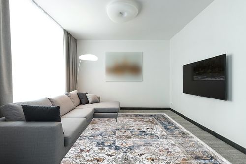 9x12 Area Rugs for Living Room: Washable Rugs Carpet for Living Room with Non-Slip Backing Non-Shedding Stain Resistant, Boho Floral Large Rugs for Dining Room Nursery Home Office (Blue Multi) in Modern Living Room with Grey Couch