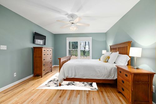 nuLOOM Iraida Contemporary Faux Cowhide Area Rug, 5' x 6' 7", Black in Teal and Orange Wood Bedroom