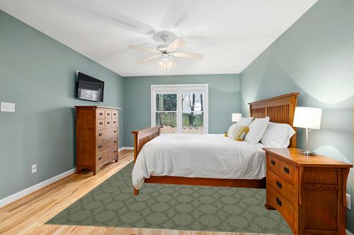 Garland Rug Sparta Area Rug, 9-Feet by 12-Feet, Sage in Teal and Orange Wood Bedroom