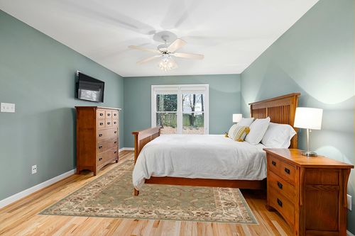 Superior Indoor Area Rug, Jute Backed Rugs for Bedroom, Living/Dining Room, Office, Entryway, Hallway, Kitchen, Traditional Floral Scroll Floor Decor, Heritage Collection, Green, 8' x 10' in Teal and Orange Wood Bedroom