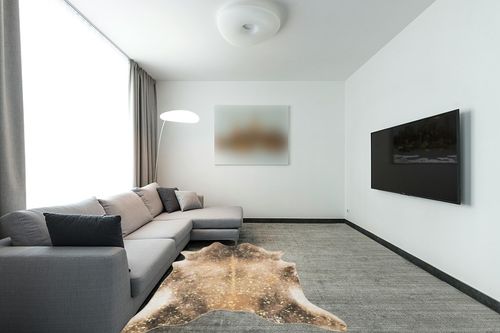 Loloi II Odessa Collection ODE-01 Mocha/Sand 5' x 6'-6" Area Rug in Modern Living Room with Grey Couch