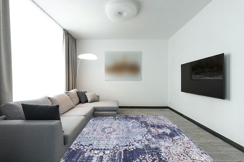 Distressed Vintage Washable Rug 8x10 in Modern Living Room with Grey Couch