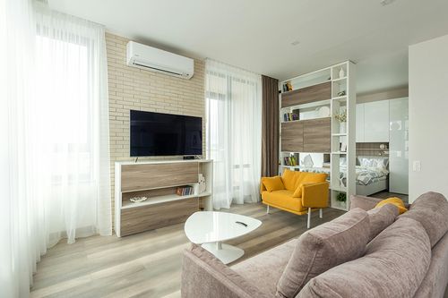 SAFAVIEH Natura Collection Area Rug - 8' x 10', Ivory, Handmade Farmhouse Boho Wool, Ideal for High Traffic Areas in Living Room, Bedroom (NAT220A) in Light Modern Living Room with TV