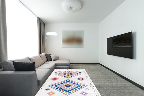 nuLOOM Marj Southwestern Kids Machine Washable Area Rug, 5x8, White Multi in Modern Living Room with Grey Couch