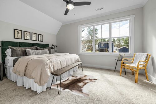 KOOBAYR Faux Cowhide Rug 5x6 feet - Cow Print Rug - Synthetic Cowhide and Western Decor Rug - Cow Rugs for Living Room Bedroom & Office Machine Washable Rug in Grey Traditional Bedroom with King Bed