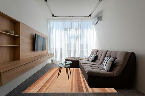 nuLOOM 8' x 10' Easy-Jute SuperiorWash Area Rug, Machine Washable, Non-Slip, for Living Room Bedroom Kids Room Nursery Home Decor, Elza Burnt Orange in Grey Living Room with Brown Couch