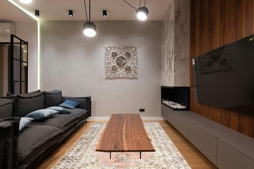 nuLOOM Ren Vintage Floral Machine Washable Area Rug, 6x9, Peach in Dark Wood Living Room with Black Couch