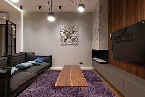 SAFAVIEH Ikat Collection Area Rug - 8' x 10', Purple, Handmade Wool, Ideal for The Living Room, Dining, Bedroom (IKT632V) in Dark Wood Living Room with Black Couch