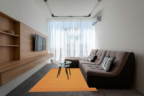 BHADOHI RUGS COLLECTION Rectangular Orange Colour, Filled Small Squares Fully Loop Tufted Area Rug, 2 CM Loop-Pile. for- Bedroom, Hallway, Kitchen, Dinningroom, Livingroom, ect. in Different Sizes. in Grey Living Room with Brown Couch