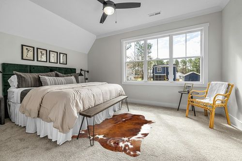 Sunshine Cowhides Genuine Brindle Tricolor Cowhide Rug - Luxurious Cow Rug for Bedroom, Living Room, and Home Decor Enthusiasts - Masterpiece of Style and Functionality - 6x6-7ft (180x210cm) in Grey Traditional Bedroom with King Bed