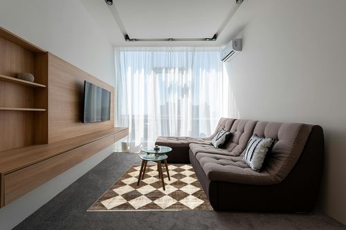 nuLOOM Meline Checkered Fringe Area Rug, 5x8, Beige in Grey Living Room with Brown Couch