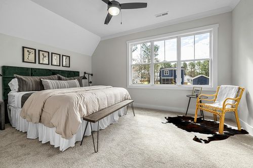 Cowhides Direct Genuine Cowhide Rug - Tricolor Cow Fur Rugs for Living Room, Bedroom & More - Authentic Cow Rug (6’x6’ Tricolor) in Grey Traditional Bedroom with King Bed