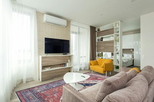 SAFAVIEH Tucson Collection Area Rug - 8' x 10', Rust & Blue, Traditional Persian Design, Non-Shedding Machine Washable & Slip Resistant Ideal for High Traffic Areas in Living Room, Bedroom (TSN153P) in Light Modern Living Room with TV