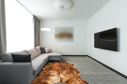 NativeSkins Brindle Faux Cowhide Rug - Sahara Sands (4.6ft x 6.6ft) - Cow Print Area Rug for a Western Boho Decor - Synthetic, Cruelty-Free Animal Hide Carpet with No-Slip Backing, Cow Print Rug in Modern Living Room with Grey Couch