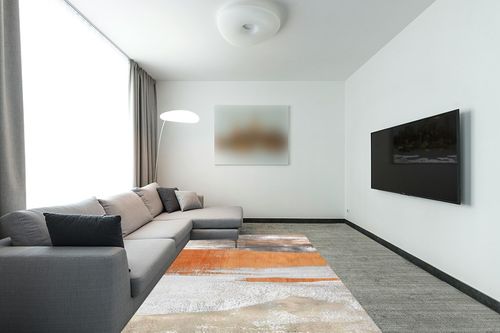 Eroyat Abstract Slim Area Rug,6x9 Feet Non-Slip Living Room Bedroom Rug,Indoor Entryway Kitchen Rug,Rug for Office,Non-Shedding Soft Low Pile Floor Decor,Gray-Orange in Modern Living Room with Grey Couch