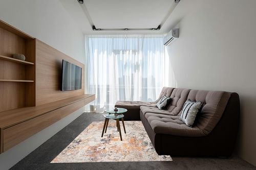 SAFAVIEH Madison Collection Area Rug - 6' x 9', Grey & Beige, Modern Abstract Design, Non-Shedding & Easy Care, Ideal for High Traffic Areas in Living Room, Bedroom (MAD453A) in Grey Living Room with Brown Couch