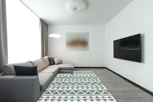 Safavieh Augustine Collection Area Rug - 6'4" x 9'6", Green & Ivory, Moroccan Boho Rustic Fringe Design, Non-Shedding & Easy Care, Ideal for High Traffic Areas in Living Room, Bedroom (AGT847Y) in Modern Living Room with Grey Couch