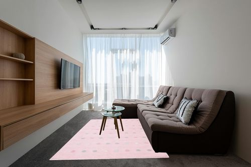 SAFAVIEH Kids Collection Area Rug - 6' x 9', Light Pink, Handmade Polka Dot Wool, Ideal for High Traffic Areas in Living Room, Bedroom (SFK803U) in Grey Living Room with Brown Couch