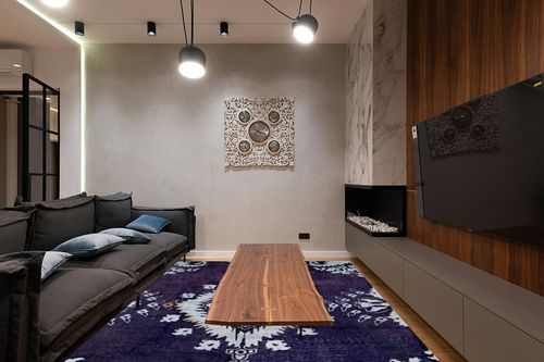 SAFAVIEH Stone Wash Collection 8' x 10' Deep Purple STW235K Hand-Knotted Medallion Premium Wool & Viscose Area Rug in Dark Wood Living Room with Black Couch
