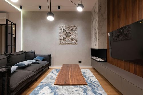 SAFAVIEH Horizon Shag Collection Area Rug - 6' x 9', Grey & Blue, Modern Abstract Design, Non-Shedding & Easy Care, 2-inch Thick Ideal for High Traffic Areas in Living Room, Bedroom (HZN890G) in Dark Wood Living Room with Black Couch