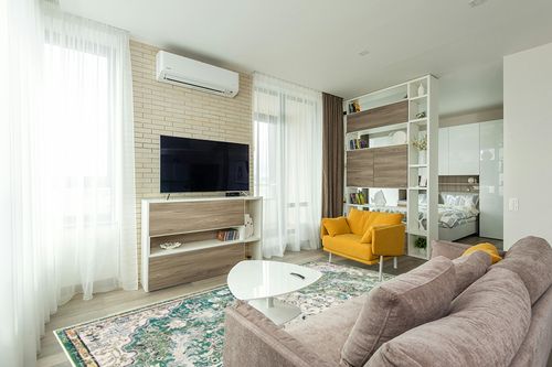 SAFAVIEH Madison Collection Area Rug - 8' x 10', Green & Turquoise, Boho Chic Medallion Distressed Design, Non-Shedding & Easy Care, Ideal for High Traffic Areas in Living Room, Bedroom (MAD447Y) in Light Modern Living Room with TV