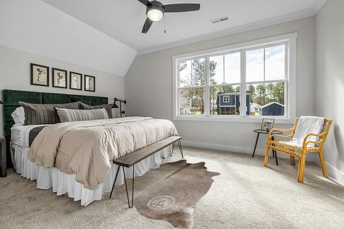 Sunshine Cowhides Genuine Taupe Cowhide Rug - Luxurious Cow Rug for Bedroom, Living Room, and Home Decor Enthusiasts - Masterpiece of Style and Functionality - 6x7-8ft (180x240cm) in Grey Traditional Bedroom with King Bed