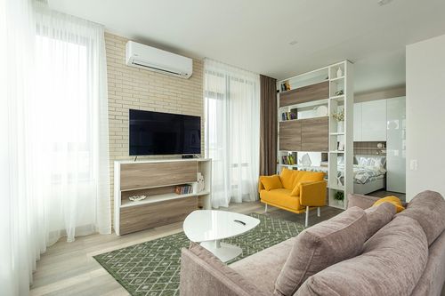 Unique Loom Outdoor Trellis Collection Area Rug - Tribal Trellis (5' 1" x 8' Rectangle, Green/ Natural) in Light Modern Living Room with TV