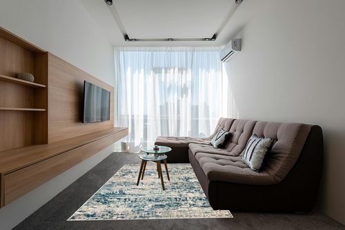 SAFAVIEH Madison Collection Area Rug - 6' x 9', Grey & Blue, Modern Abstract Design, Non-Shedding & Easy Care, Ideal for High Traffic Areas in Living Room, Bedroom (MAD460K) in Grey Living Room with Brown Couch