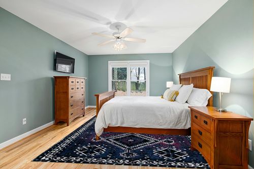 SAFAVIEH Vintage Hamadan Collection Area Rug - 9' x 12', Purple & Black, Oriental Distressed Design, Non-Shedding & Easy Care, Ideal for High Traffic Areas in Living Room, Bedroom (VTH293V) in Teal and Orange Wood Bedroom