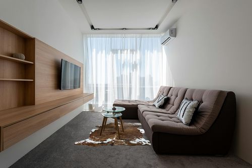 bonanza leathers Genuine Cowhide Rug Classic Tricolor Size S/L/XL 5X6/6X7/7X8 FT (L) in Grey Living Room with Brown Couch